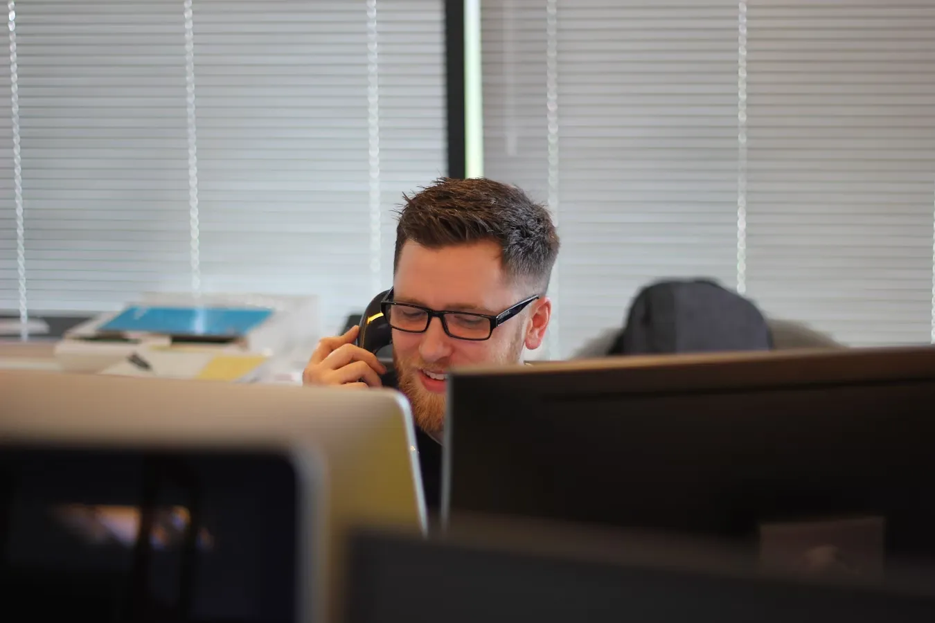 Student reviewing rejection emails on laptop