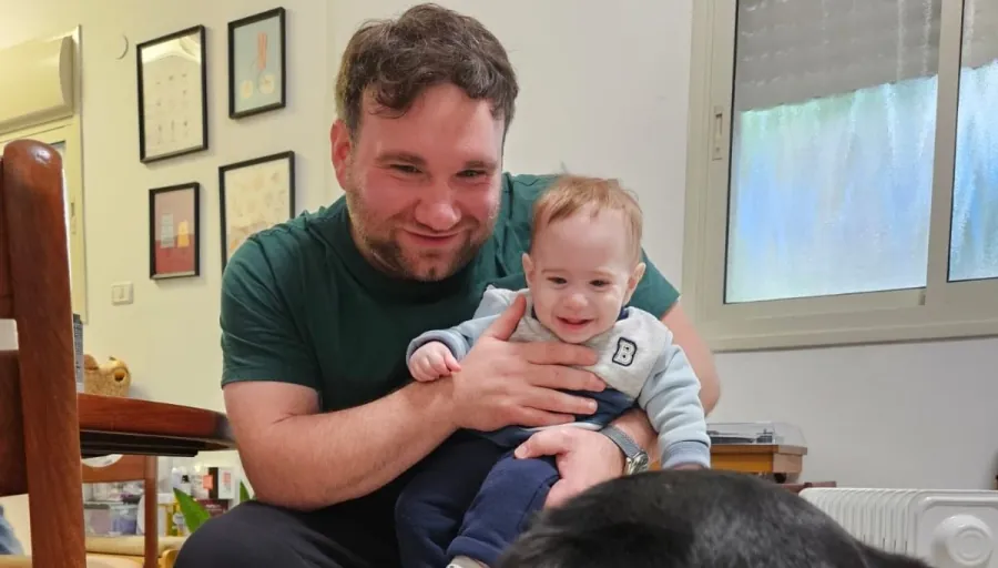 Lior with his son Luca and the friends dog.